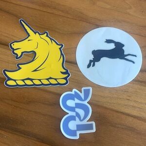 Trio of stickers from bandit Boston marathon and tracksmith
